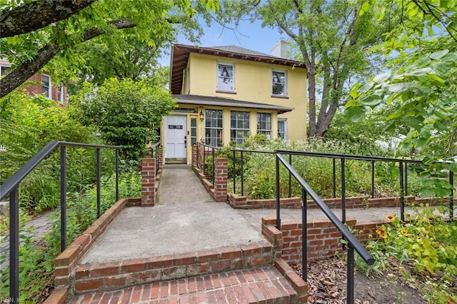 1231 Boissevain Ave, Norfolk, VA 23507 - view of front of property featuring stucco siding and a chimney
