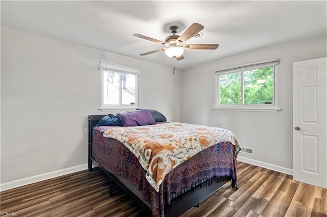 2720 Juniper St, Norfolk, VA 23513 - bedroom with multiple windows, baseboards, and wood finished floors