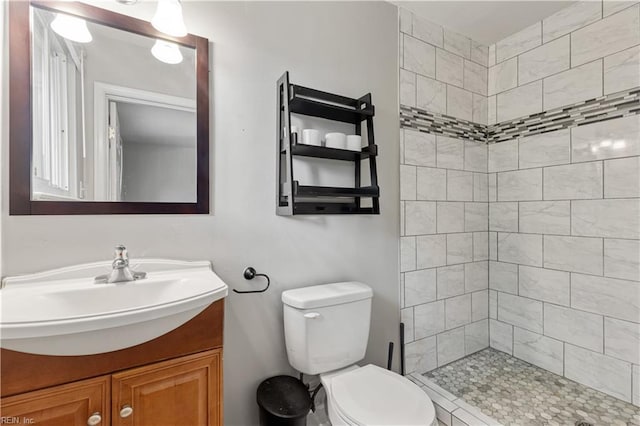 2720 Juniper St, Norfolk, VA 23513 - bathroom with vanity, toilet, and a tile shower