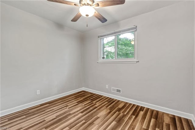 2720 Juniper St, Norfolk, VA 23513 - spare room with baseboards, wood finished floors, and a ceiling fan