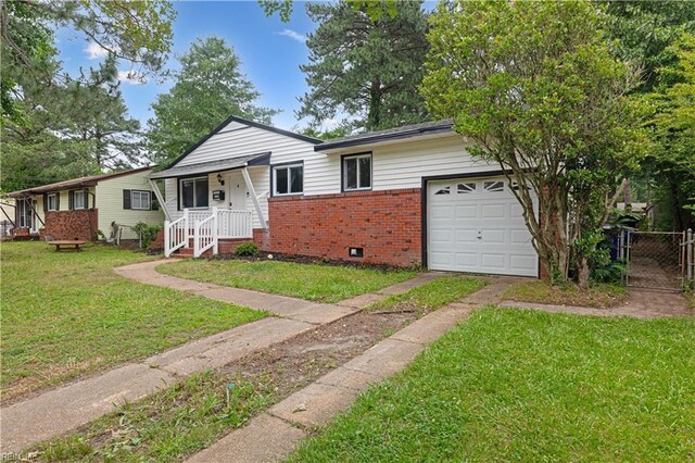 2720 Juniper St, Norfolk, VA 23513 - view of front of house with brick siding, crawl space, driveway, a gate, and a garage