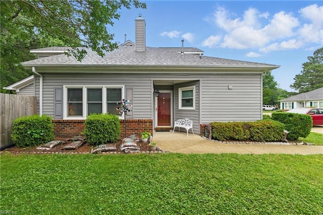 104 Pheasant Watch, Yorktown, VA 23692 - rear view of property with a chimney and brick siding