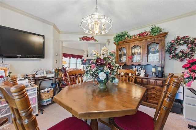 104 Pheasant Watch, Yorktown, VA 23692 - dining space featuring a chandelier, crown molding, and carpet