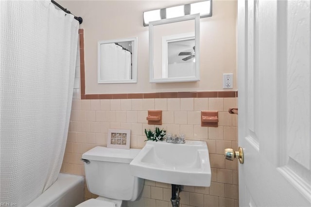 221 Herbert Ave, Hampton, VA 23664 - full bath featuring tile walls, a sink, toilet, shower / bath combo, and wainscoting