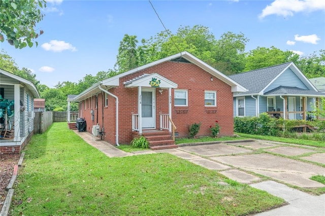 221 Herbert Ave, Hampton, VA 23664 - bungalow-style home with brick siding
