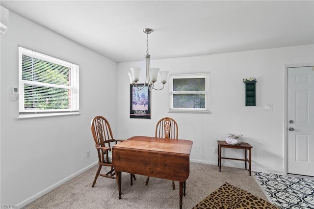 221 Herbert Ave, Hampton, VA 23664 - dining area with a chandelier, carpet floors, and baseboards