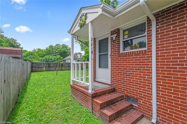 221 Herbert Ave, Hampton, VA 23664 - view of exterior entry featuring brick siding and crawl space