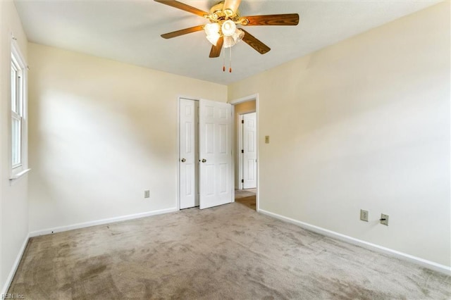 214 Silver Isles Blvd, Hampton, VA 23664 - carpeted empty room with baseboards and ceiling fan