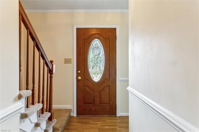 214 Silver Isles Blvd, Hampton, VA 23664 - foyer entrance featuring stairs, light wood-style flooring, crown molding, and baseboards
