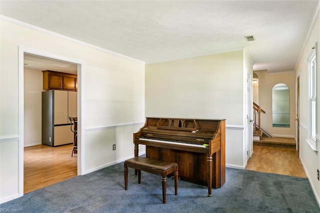 214 Silver Isles Blvd, Hampton, VA 23664 - sitting room with carpet, ornamental molding, arched walkways, stairway, and baseboards