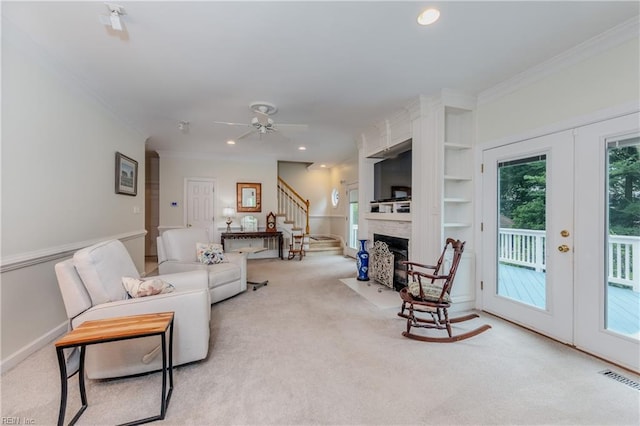 2504 William Tankard Dr, Williamsburg, VA 23185 - living room with crown molding, carpet floors, stairs, french doors, and recessed lighting