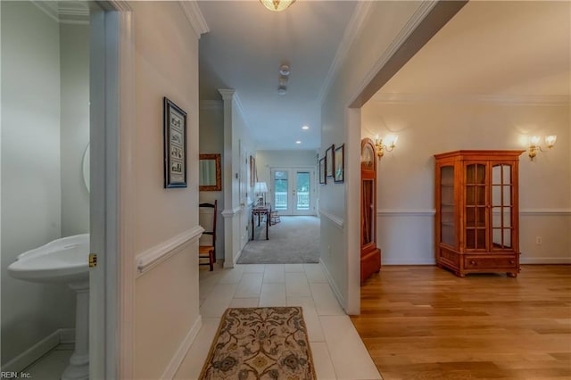 2504 William Tankard Dr, Williamsburg, VA 23185 - hall featuring french doors, wood finished floors, and ornamental molding