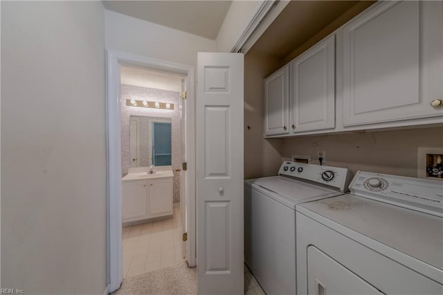 238 Wingate Dr, Williamsburg, VA 23185 - laundry room featuring cabinet space, washing machine and dryer, and light tile patterned floors