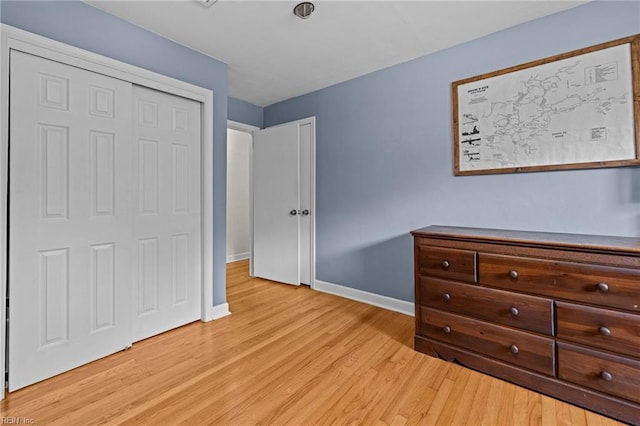 404 Briarfield Dr, Chesapeake, VA 23322 - unfurnished bedroom featuring light wood finished floors, baseboards, and a closet
