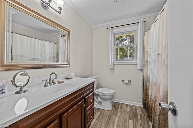404 Briarfield Dr, Chesapeake, VA 23322 - full bath featuring crown molding, vanity, baseboards, toilet, and wood finished floors