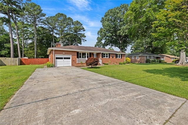 404 Briarfield Dr, Chesapeake, VA 23322 - view of front of home featuring brick siding, a garage, a chimney, and driveway