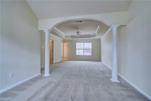5233 Winery Dr, Chesapeake, VA 23321 - carpeted empty room featuring a tray ceiling, a ceiling fan, arched walkways, baseboards, and ornamental molding