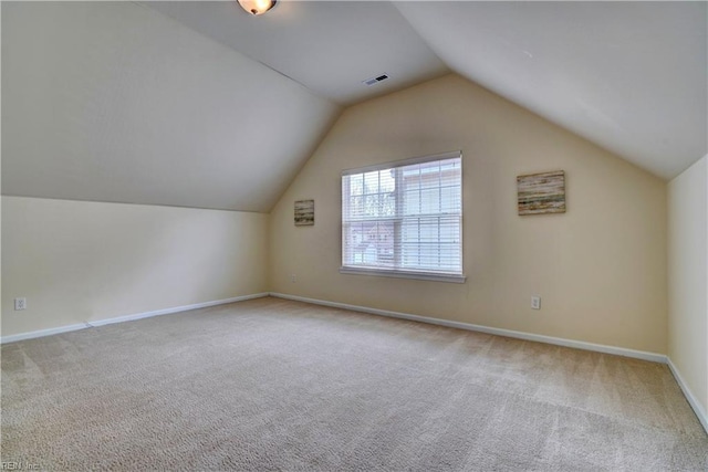 5233 Winery Dr, Chesapeake, VA 23321 - additional living space with carpet floors, baseboards, and vaulted ceiling