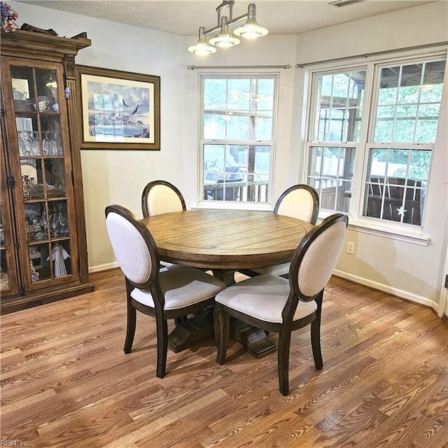 520 Hickory Cres, Smithfield, VA 23430 - dining room with light wood-type flooring and baseboards