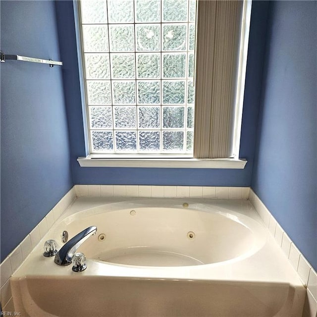 520 Hickory Cres, Smithfield, VA 23430 - bathroom featuring healthy amount of natural light and a tub with jets