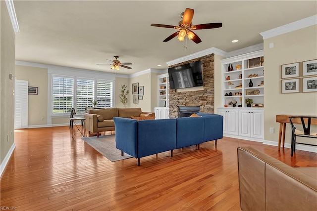 921 Justin Lee Way, Chesapeake, VA 23322 - living area with a ceiling fan, ornamental molding, light wood-type flooring, a fireplace, and baseboards
