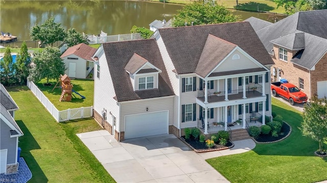 921 Justin Lee Way, Chesapeake, VA 23322 - view of front of property with covered porch, a water view, driveway, and a garage