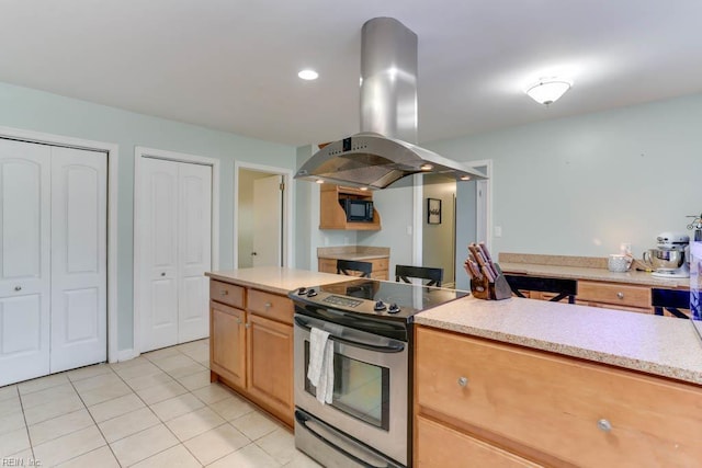 20 Hatteras Lndg, Hampton, VA 23669 - kitchen featuring stainless steel electric range oven, island exhaust hood, light tile patterned flooring, light countertops, and recessed lighting