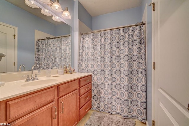 401 Blue Heron Trl, Carrollton, VA 23314 - full bath featuring vanity, curtained shower, and tile patterned flooring