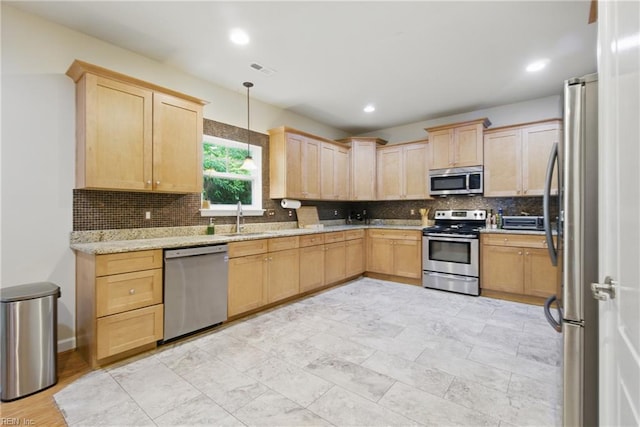 700 Dickens Pl, Chesapeake, VA 23322 - kitchen with stainless steel appliances, light brown cabinetry, a sink, tasteful backsplash, and hanging light fixtures