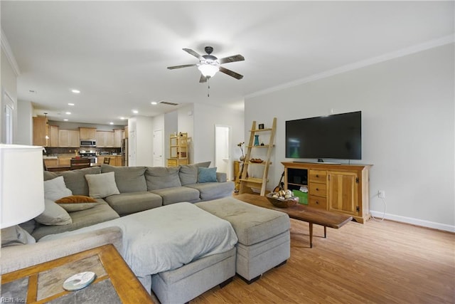 700 Dickens Pl, Chesapeake, VA 23322 - living room featuring ornamental molding, a ceiling fan, light wood-style flooring, baseboards, and recessed lighting