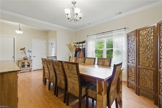 700 Dickens Pl, Chesapeake, VA 23322 - dining room with light wood-style flooring, a chandelier, and crown molding