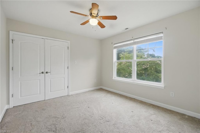 700 Dickens Pl, Chesapeake, VA 23322 - unfurnished bedroom featuring baseboards, carpet, a closet, and a ceiling fan