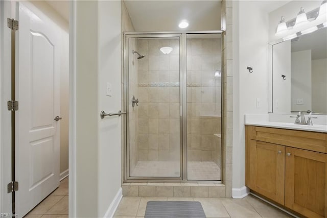 700 Dickens Pl, Chesapeake, VA 23322 - bathroom with tile patterned floors, vanity, a stall shower, and baseboards