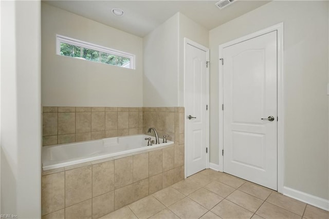 700 Dickens Pl, Chesapeake, VA 23322 - bathroom featuring a bath, tile patterned floors, and baseboards