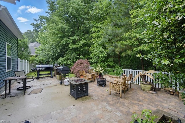 700 Dickens Pl, Chesapeake, VA 23322 - view of patio featuring grilling area and an outdoor living space with a fire pit