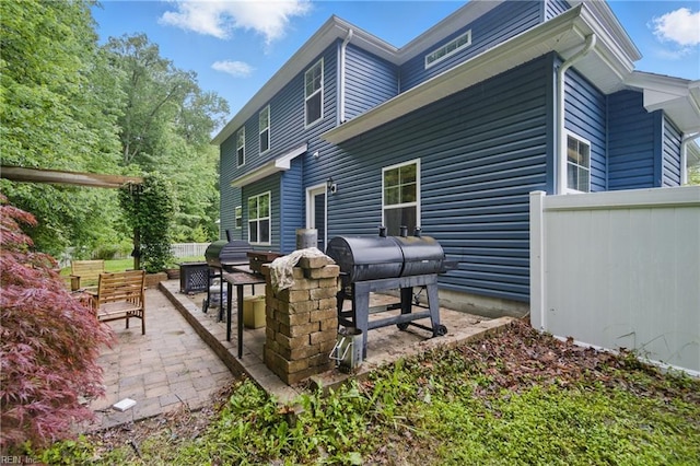 700 Dickens Pl, Chesapeake, VA 23322 - rear view of property with a patio area