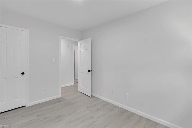 392 Deputy Ln Unit D, Newport News, VA 23608 - unfurnished bedroom featuring baseboards and light wood-style flooring