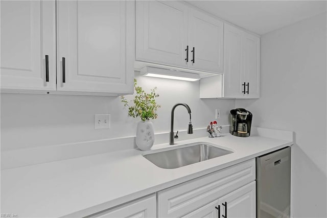 392 Deputy Ln Unit D, Newport News, VA 23608 - kitchen featuring dishwasher, a sink, white cabinets, and light countertops
