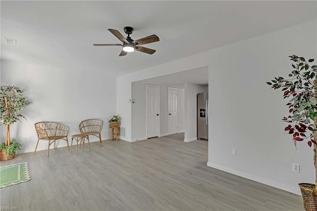 392 Deputy Ln Unit D, Newport News, VA 23608 - living area with ceiling fan, wood finished floors, and baseboards