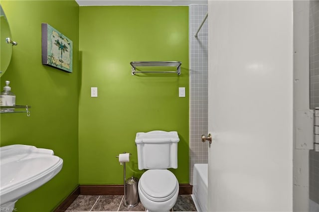 7720 Dunfield Pl Unit A3, Norfolk, VA 23505 - bathroom with baseboards, toilet, tub / shower combination, and a sink