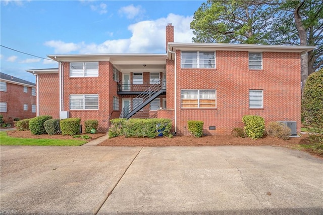 7720 Dunfield Pl Unit A3, Norfolk, VA 23505 - view of property with cooling unit and stairs