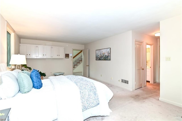 5209 Studeley Ave, Norfolk, VA 23508 - bedroom with light carpet and baseboards
