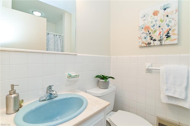 5209 Studeley Ave, Norfolk, VA 23508 - bathroom with toilet, tile walls, and vanity