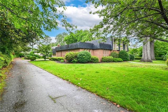 5209 Studeley Ave, Norfolk, VA 23508 - view of property exterior featuring a yard and mansard roof