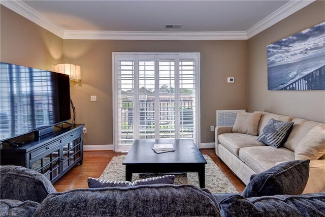5413 Foundation St, Williamsburg, VA 23188 - living area featuring baseboards, crown molding, and wood finished floors