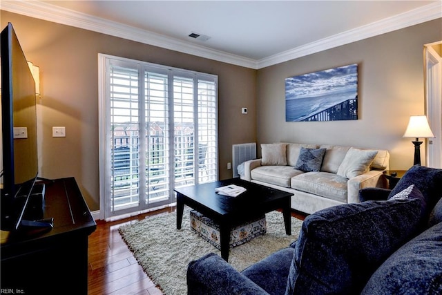 5413 Foundation St, Williamsburg, VA 23188 - living area with wood finished floors, ornamental molding, and baseboards
