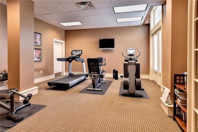 5413 Foundation St, Williamsburg, VA 23188 - workout room featuring a paneled ceiling, carpet flooring, and baseboards