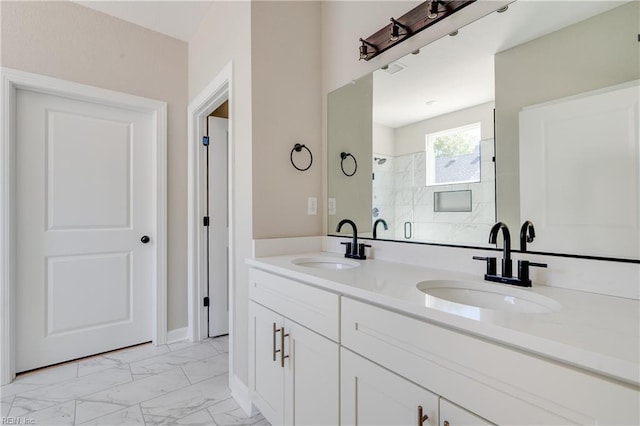 23041 Calvin Dr, Franklin, VA 23851 - bathroom with marble finish flooring, double vanity, and a shower
