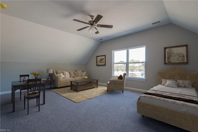 23041 Calvin Dr, Franklin, VA 23851 - carpeted bedroom with lofted ceiling, baseboards, and ceiling fan