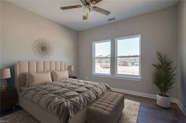 23041 Calvin Dr, Franklin, VA 23851 - bedroom with wood finished floors, baseboards, and ceiling fan